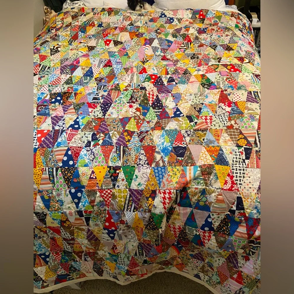 Vintage hand made quilt triangular fabric with solid reverse side